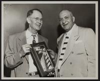 Tom Baird with Dr. J.B. Martin and the National Baseball Congress plaque, 2 copies