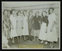 Group of women (seven) and one man at Hair Styling Show