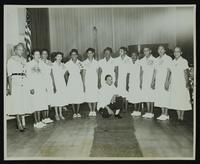 Group of women (twelve) and one man from Powder Box Academy Hair Style Review