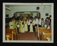 Willie Moore and Doris McPherson[?] wedding at New Testament Church (reception at St. Peter Claver), 28 August 197