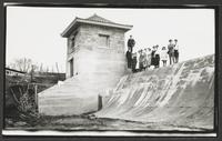 Group Standing on Dam