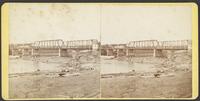 Construction of dam and newly constructed bridge over Kansas River