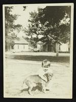 Unidentified boy with dog