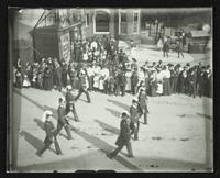 Parade of men with feathered hats (Semi-Centennial Parade)