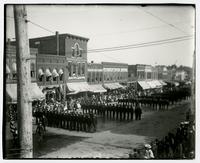 Parade scene of rows of men (Semi-Centennial Parade)