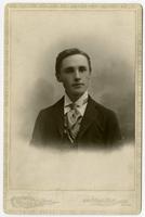 Portrait of a young man with no facial hair  