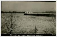High water caused by ice jam (shows train)