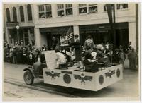 KU contrast in training in fine arts, 1866 to "now" float (75th Anniversary Historic Parade)