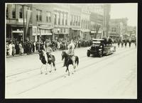 Two Native Americans and two buffalo from KU museum (75th Anniversary Historic Parade)