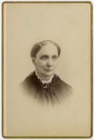 Small portrait of a woman with a round brooch