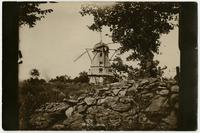 Windmill - Front view with large rocks in foreground