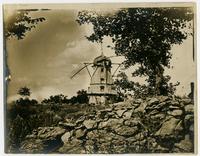 Windmill - Front view with large rocks in foreground