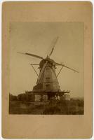Windmill - Front view with related buildings and two women