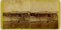 Construction of dam and newly constructed bridge over Kansas River