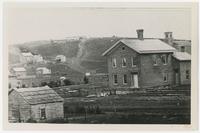 Looking toward Mount Oread, showing house at 945 Kentucky Street and Unitarian Church on Ohio Street
