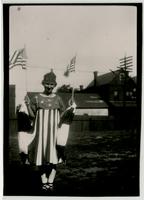 Group of women wearing and carrying flags