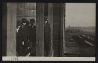Views at railroad bridge and water treating plant; Junior and Cooky; views of new cement viaduct arch