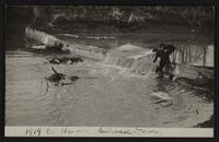 Views at railroad bridge and water treating plant; Junior and Cooky; views of new cement viaduct arch