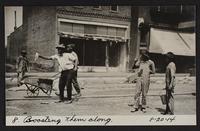 Starting paving on Front Street