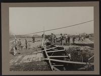 Concrete gang working on septic tank