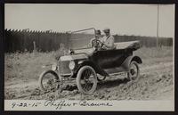 Charles Browne and Willard Phiffer in auto; pictures taken for Paving Commission, hauling asphalt