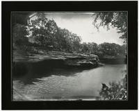 Woman with Umbrella on Rock Bank of Wakarusa River