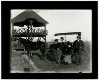 Bismark Grove- Four People With Buggy by Gazebo