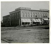 State Bank, Nathan Frank Groceries, and Theo. Pohler Groceries - Southeast Corner of 9th &amp; Massachusetts St.