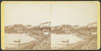 Construction of dam and newly constructed bridge over Kansas River