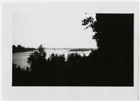 Looking east from Santa Fe Railroad tracks at river and flood plain (1892 Flood)