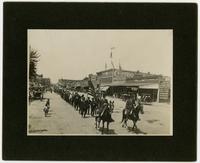 Parade in front of Watkins Bank (Semi-Centennial Parade)