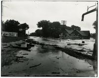 High water in street near The Palace store (1903 Flood)