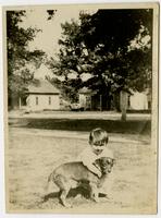 Unidentified boy with dog