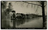High water caused by ice jam (shows train with man on engine)