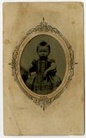 Portrait of infant in a dress, ornate frame design