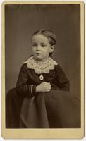 Portrait of a young girl with a lacy white collar and oval pendant