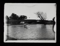 Boat Celeste? on river near bridge