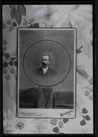 Man in bicycle wheel (copy photo)