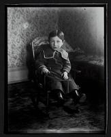 Boy in rocking chair