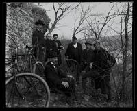 Group of men with bicycles