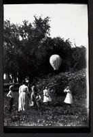 Children launching balloon