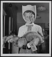 Douglas County Fair - Big Springs - Clothing Display - Jerry Collins holding coonskin cap.