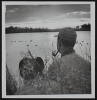 Hunting - scarcity of ducks - Orval Paxton (L) and Carl Amyx.