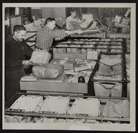 Lawrence Post Office Clerks (L to R) Woodley Wilson, Jack Riley, and George Hulteen.