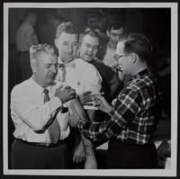 Salk Vaccine - Lions Club members (L to R) Jim Brooks, Alfred Skeet, Bill Rowlands; Dr. Alex Mitchell.