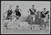 LHS Track Baker Relays Don Achers (Left) and Gaylen Cawley. Others not identified.