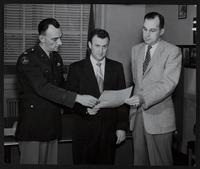 National Foundation of Infantile Paralysis - Certificate of Appreciation to Sunflower Ordnance Works. (L to R) Major Donald J Catherman; Lewis C. Rankin; George H. Ripley.