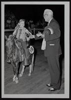 Lawrence Horse Show - Deanna Rogers on &quot;Champ&quot; receives ribbon from A. D. White of Ottawa.