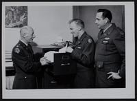 National Guard - Local unit of Company H 137th infantry regiment - inspection by Lieutenant Colonel Duke Bryant, Chicago (Left); CWO Don Ousdhal (center) and Captain Karl H. Reber.