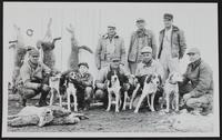 Farmers - Coyote Hunters (L to R) (front row) Charley Elm; Leonard Hefner; Alvin Heiner; Frank Lutz; Arlie Hefner (back row) Andrew Lutz; Carl Schwartz; Orvil Pohl.